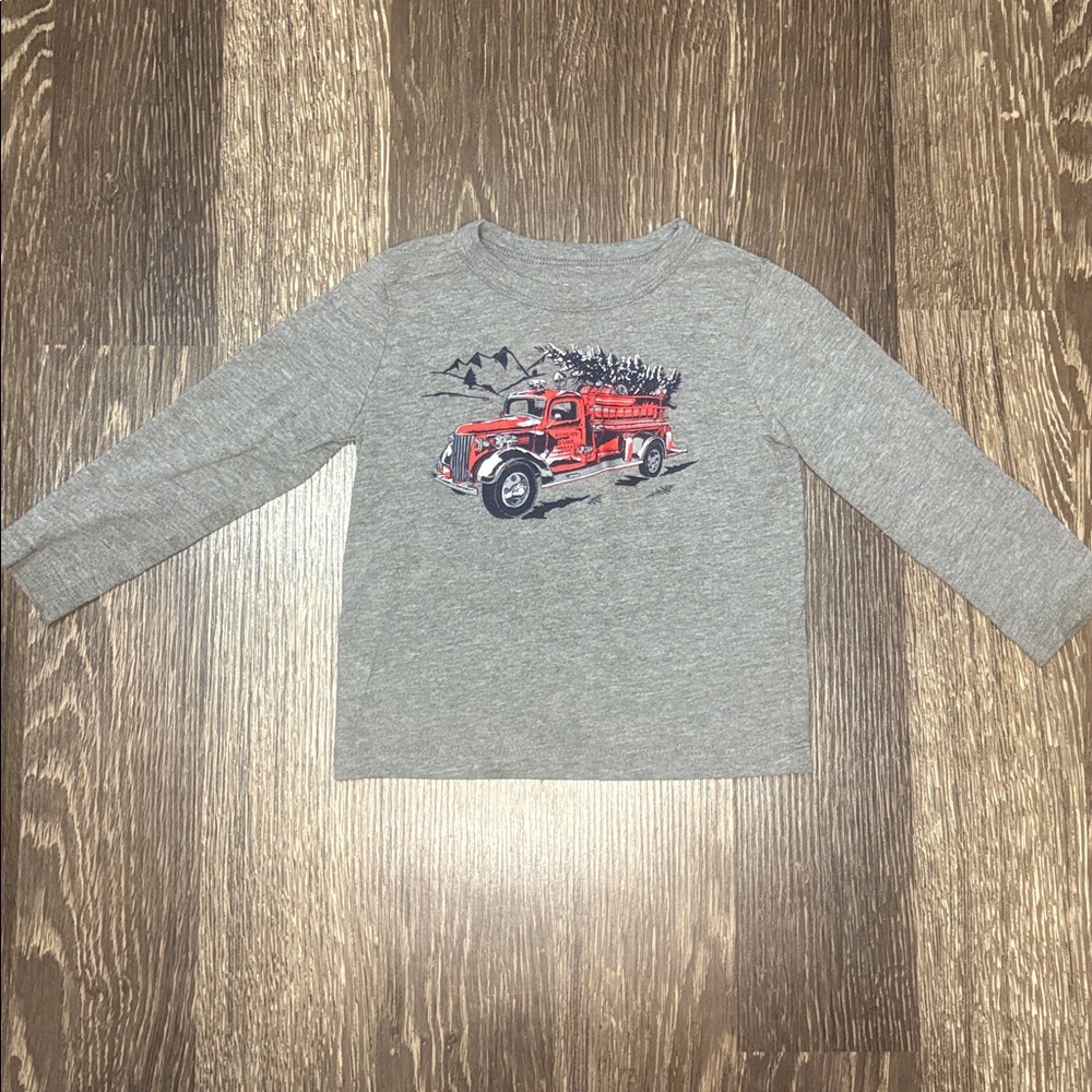 Boys Oshkosh long sleeve shirt with a  red truck and Christmas tree 18 months